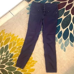 Navy blue pants with a zipper with three button waist